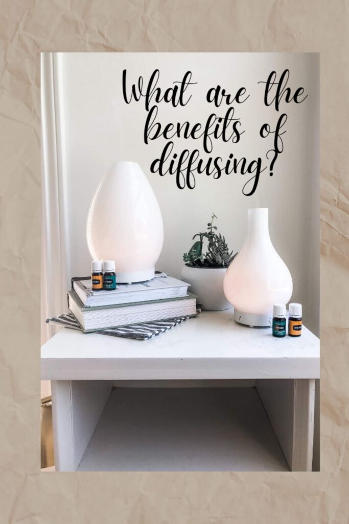 What are the benefits of diffusing essential oils. Diffuser sitting on books on a cute table