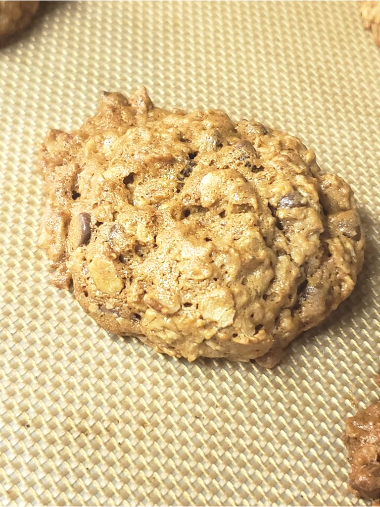 Close up of baked Chocolate Chip Oatmeal Peanut Butter Cookie