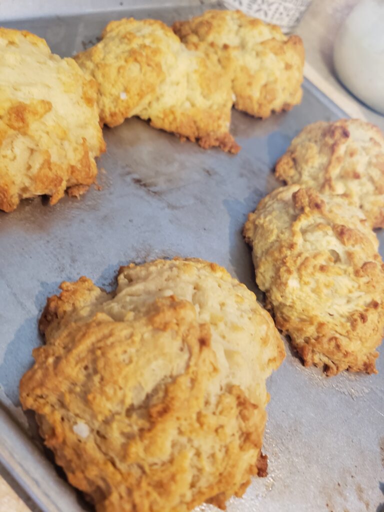 Cooked Honey Drop Biscuits on baking sheet