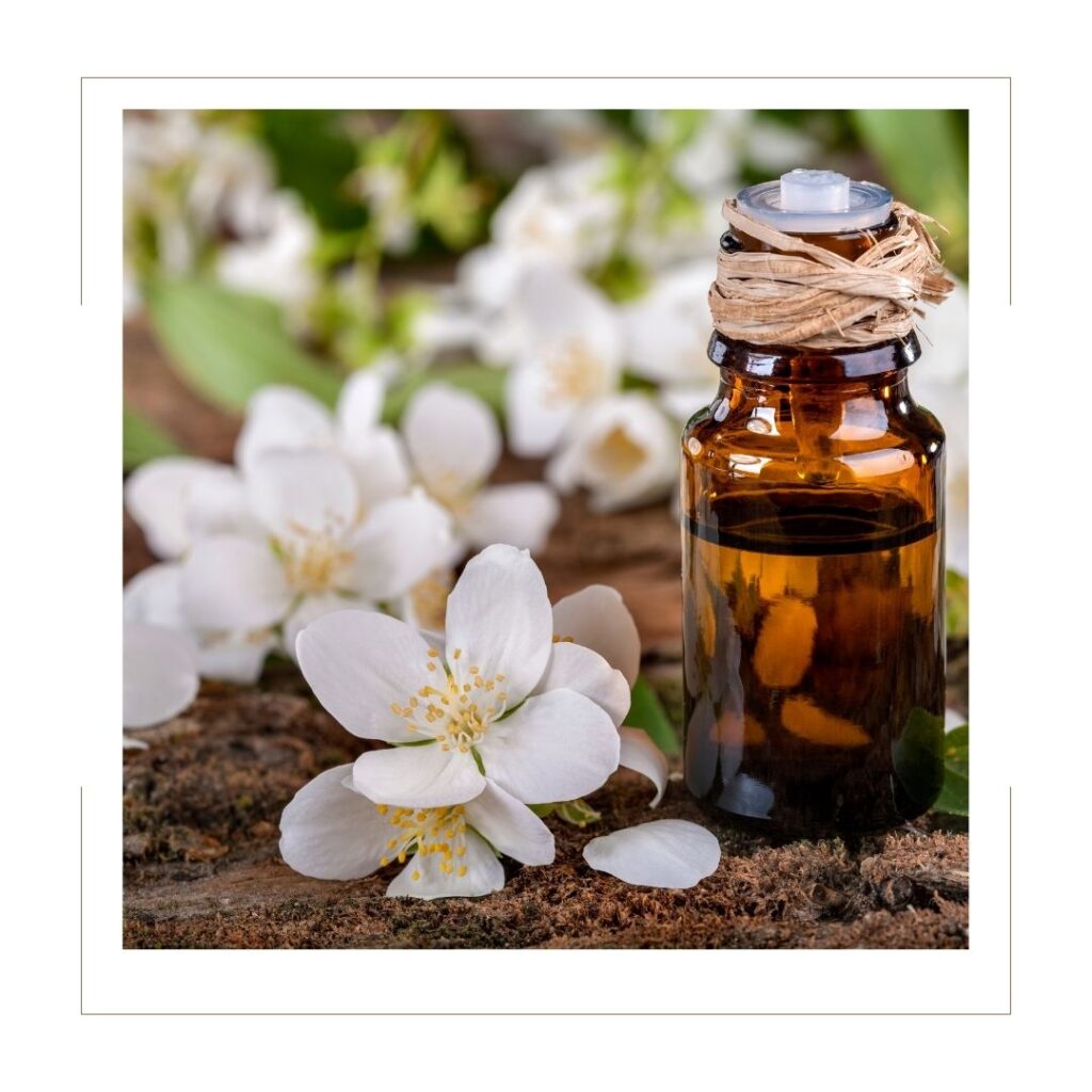 Decorative Essential Oil bottle with white flowers