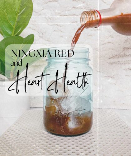 Ningxia Red and Heart Health, Ningxia pouring into a mason jar with a small plant in the back.