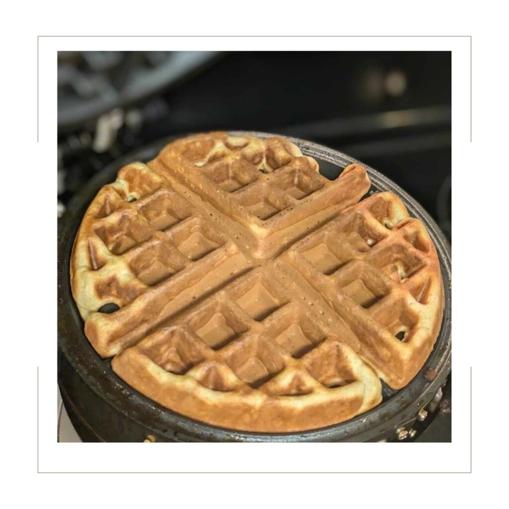 cooked waffle on waffle iron