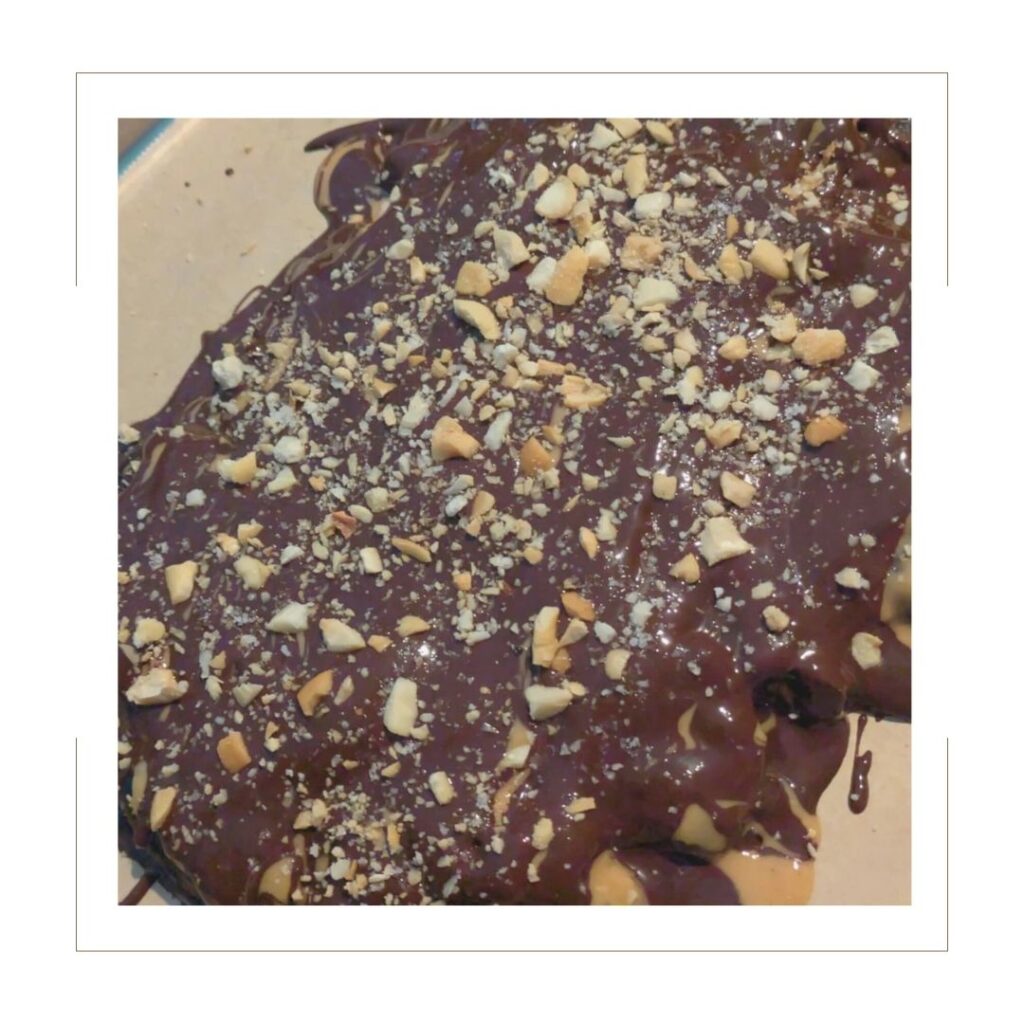 Salted Chocolate Covered Peanut Butter Date Bites with peanuts and salt on top