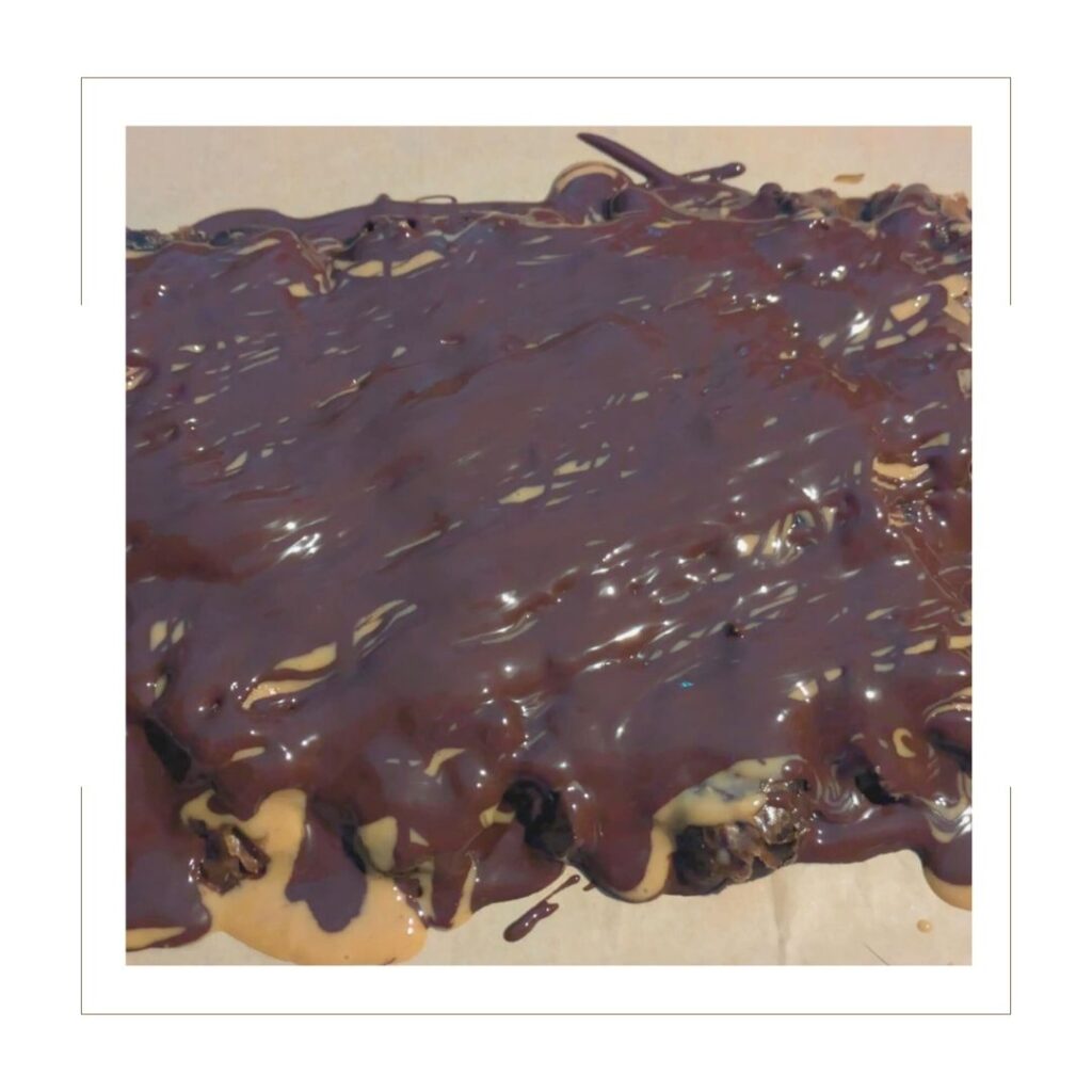 Salted Chocolate Covered Peanut Butter Date Bites at the chocolate stage