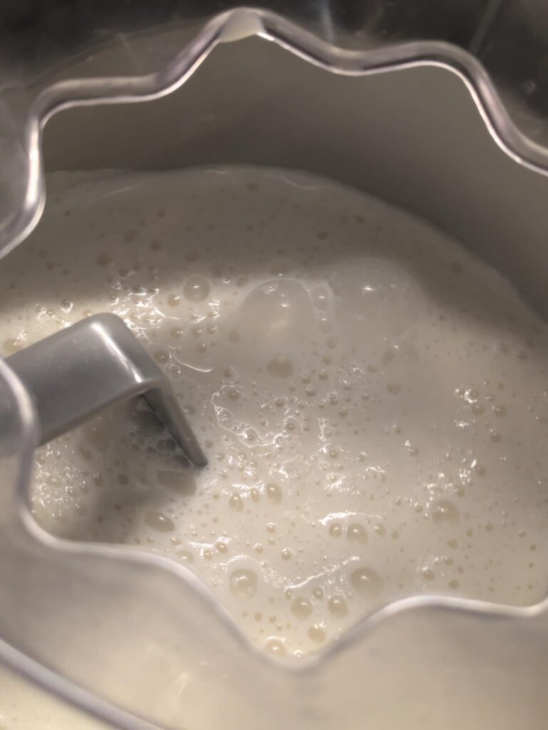 Homemade Vanilla Ice Cream in Ice Cream Maker - Liquid Mixture