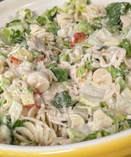 Caesar Salad Pasta Salad in a yellow bowl.
