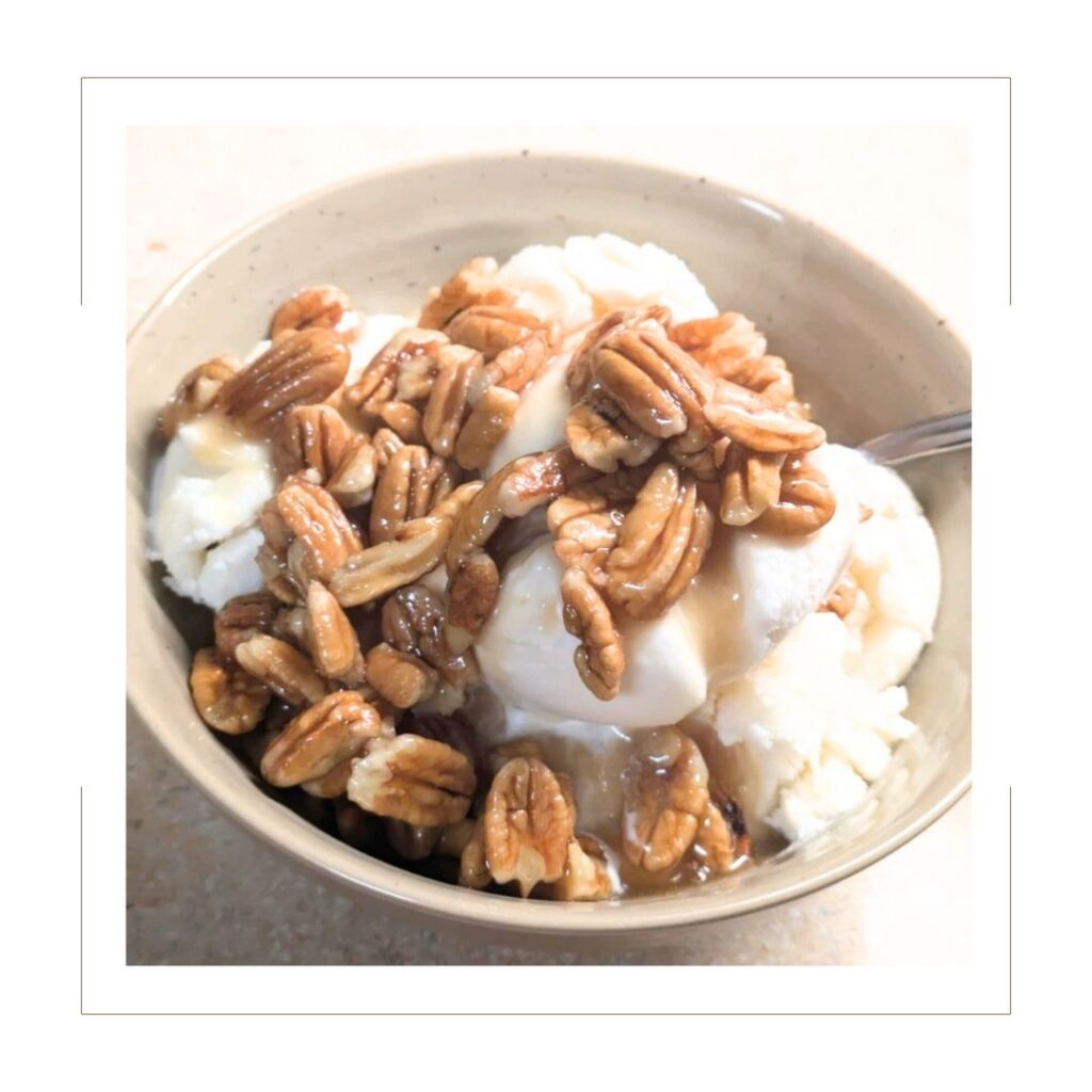 Vanilla Ice Cream with Maple Butter Pecan Topping in a bowl