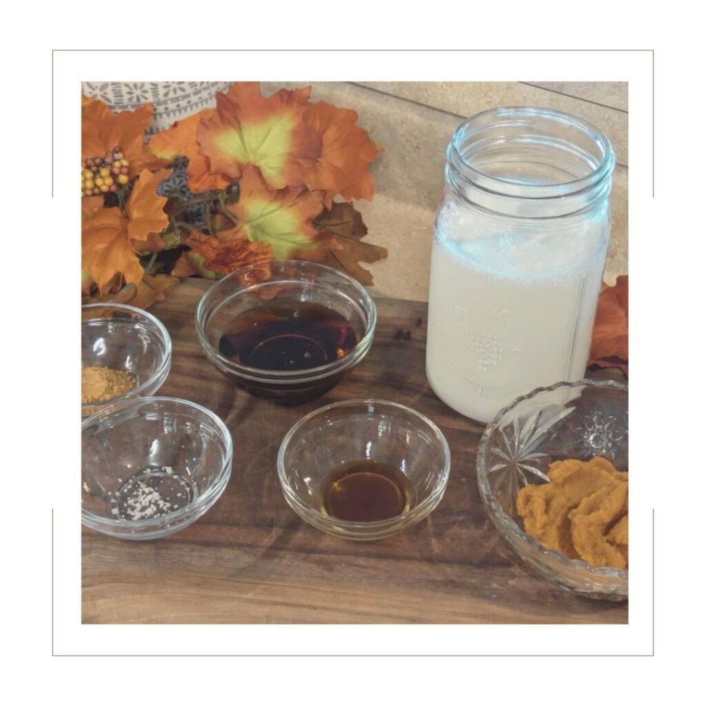 Ingredients in glass jars for Pumpkin Spice Creamer